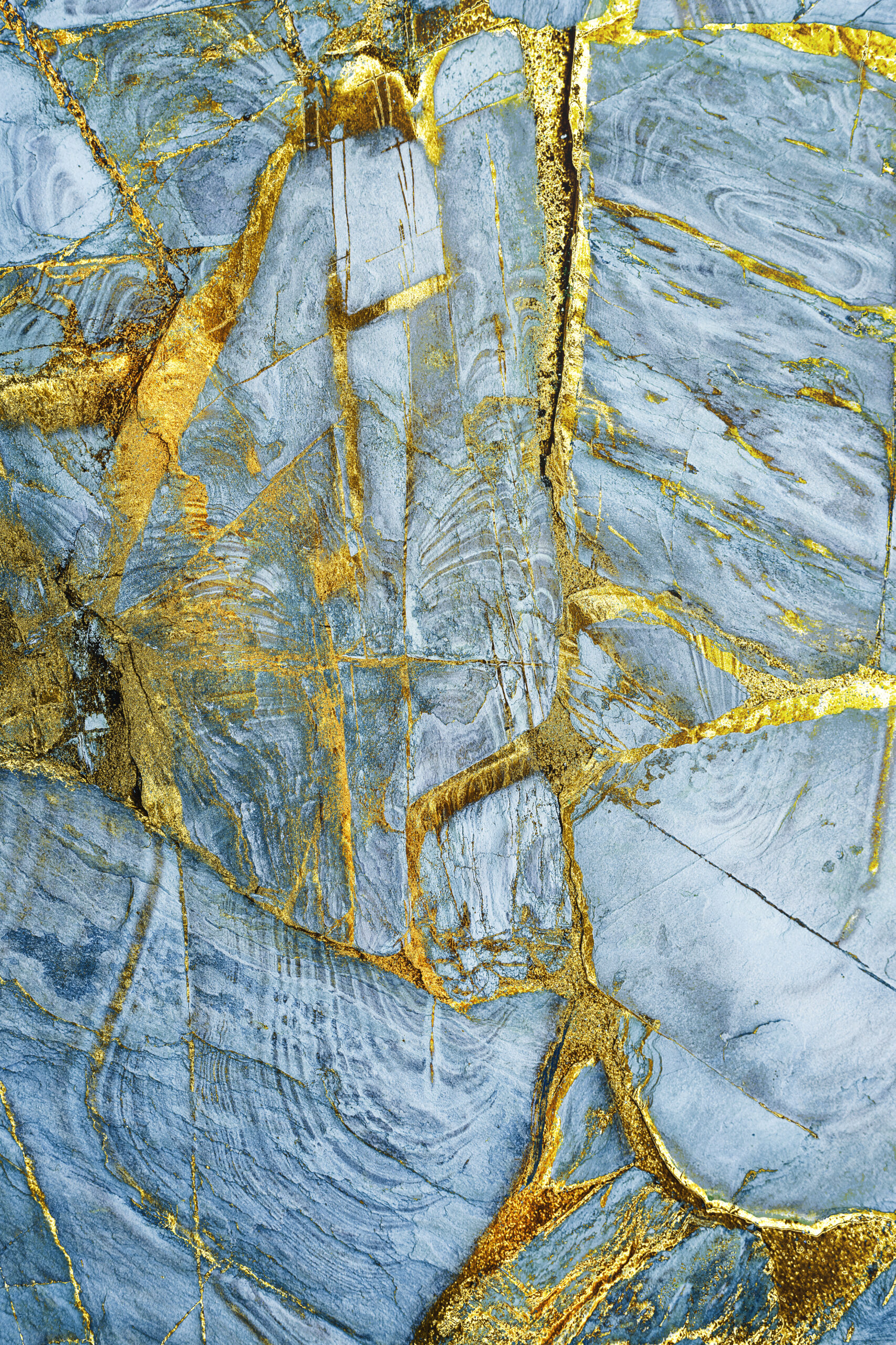 Abstract blue and gold marble texture. Luxurious background.