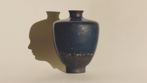 Ceramic vase whose silhouette suggests two facing profiles