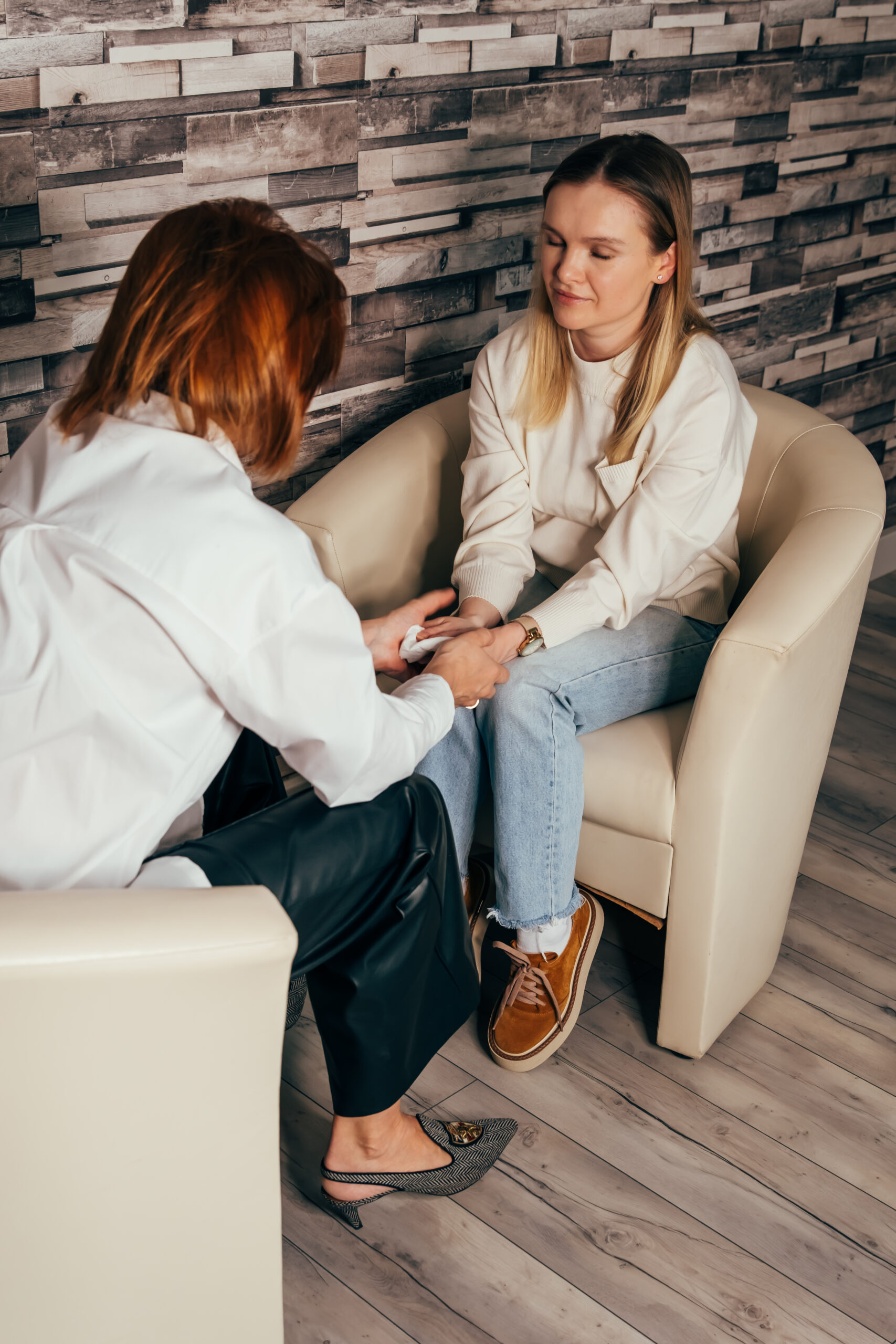 Therapist comforting a patient during a session.